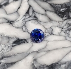 Faceted Benitoite, Round Cut, .32 cts., 4.2 mm, VVS