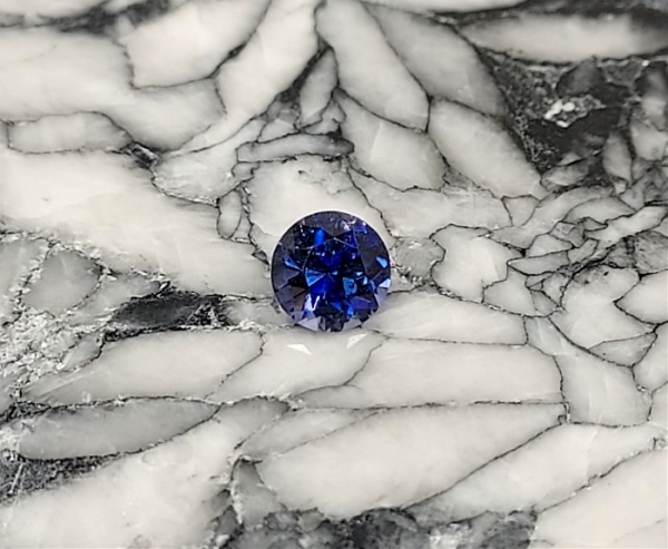 Faceted Benitoite, Round Cut, .45 cts., 4.6 mm, Eye Clean