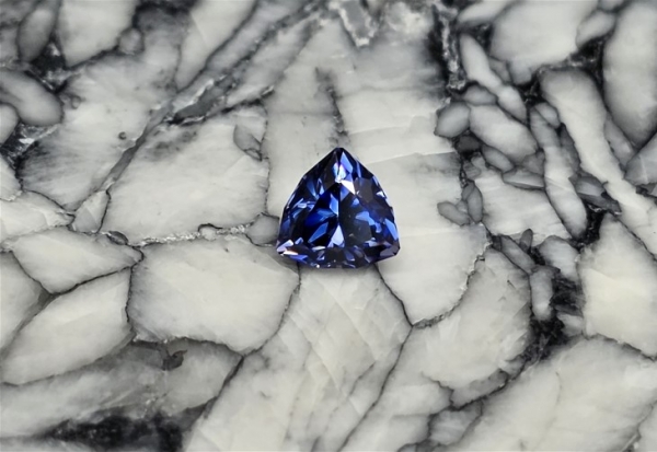 Faceted Benitoite, Round Cut, .74 cts., 5.2 mm, VVS