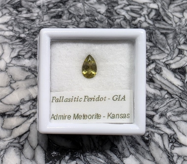 Pallasitic Peridot Gem .32 cts., with G.I.A. Report